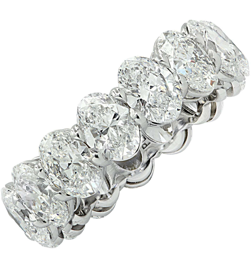 GIA Certified 7.55 Ct Oval Cut Diamond Eternity Band in Platinum by Vivid Diamonds, showcasing brilliant oval diamonds set in a luxurious platinum band, symbolizing elegance and timeless beauty.