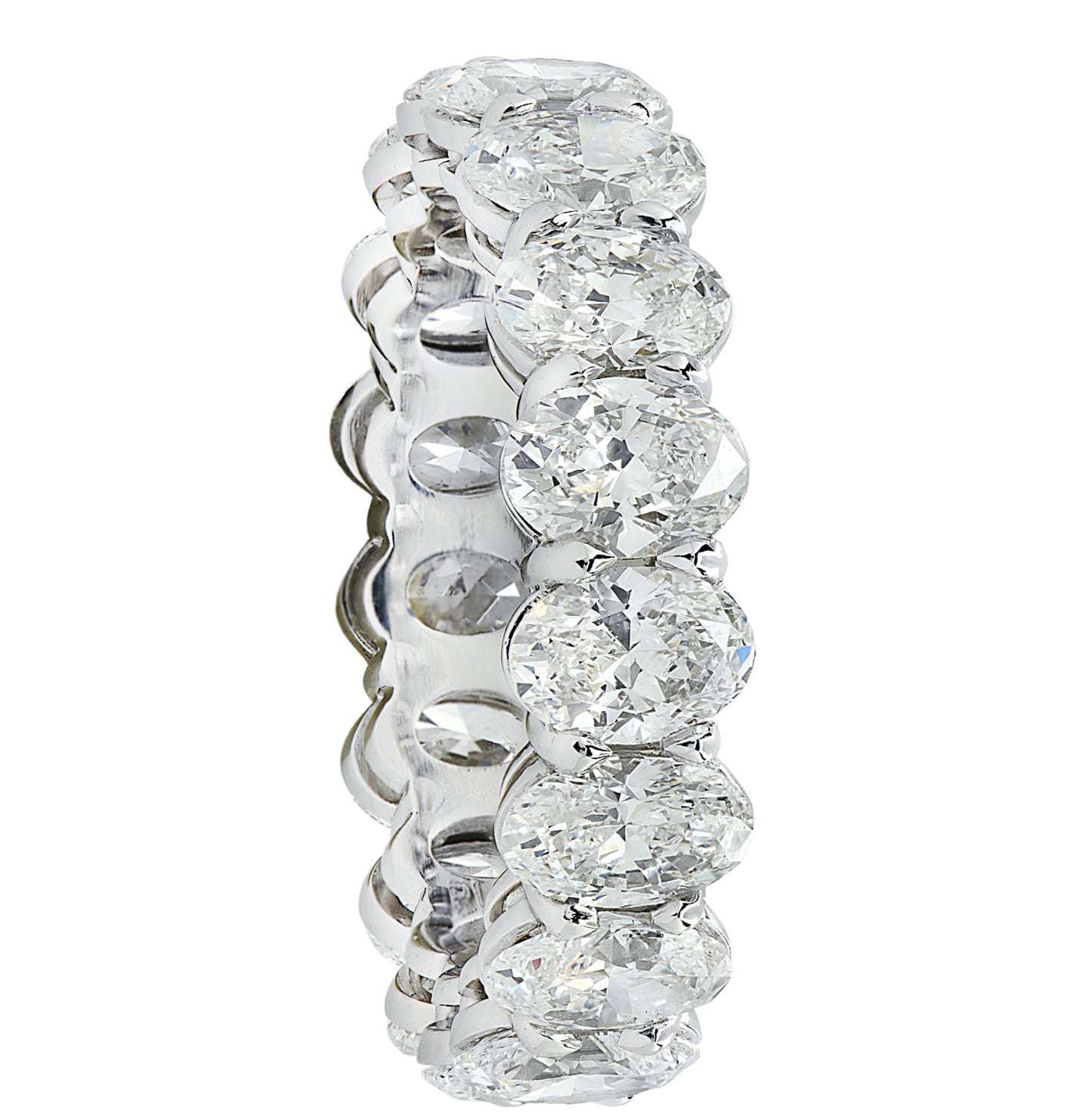 Profile view of the Vivid Diamonds GIA Certified 5.35 Carat Oval Diamond Eternity Band in Platinum, featuring exquisite craftsmanship and a seamless design filled with sparkling oval diamonds.
