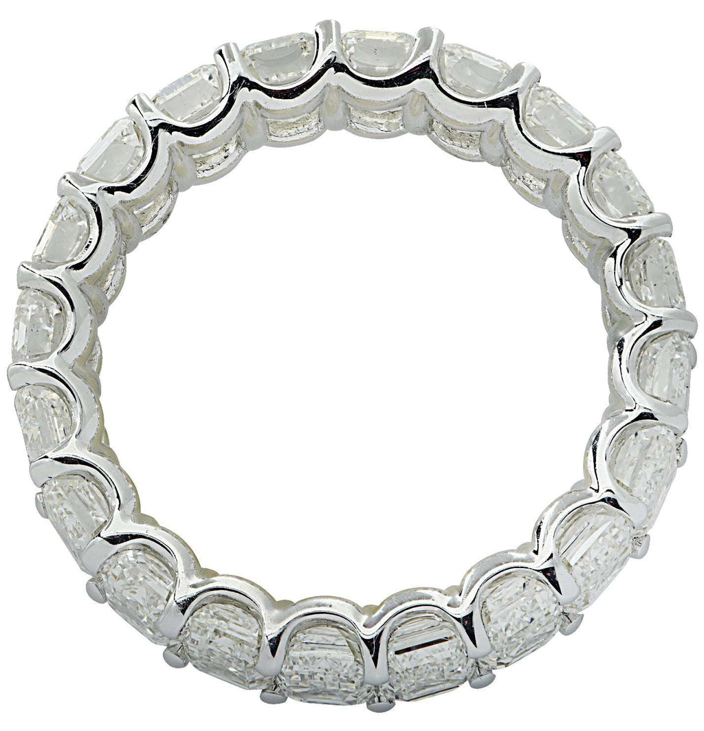Vivid Diamonds 6.27 Ct Emerald Cut Diamond Eternity Band in 18K White Gold, highlighting the elegant full circle design adorned with sparkling GIA certified emerald cut diamonds.