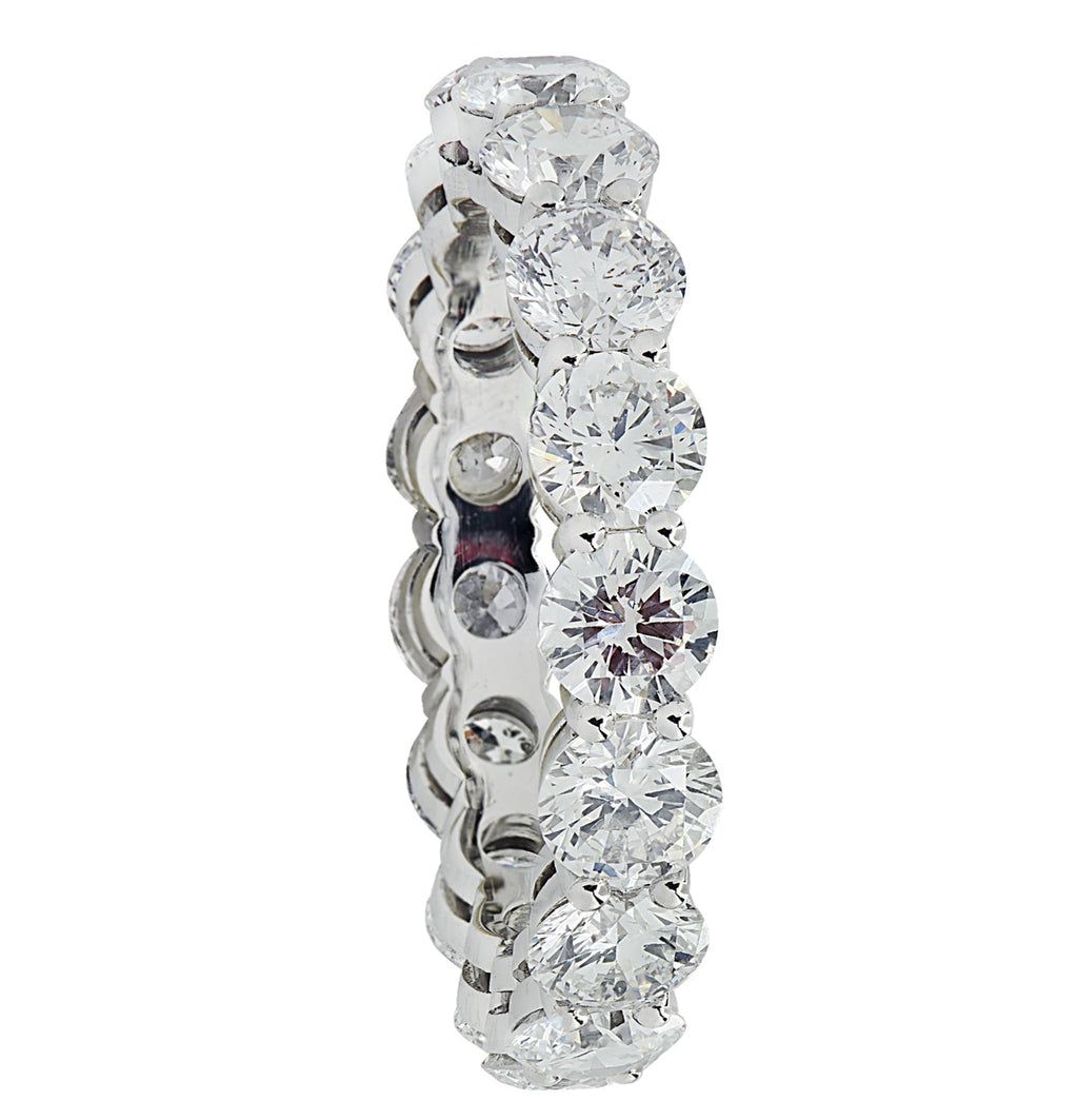Elegant side view of the Vivid Diamonds 3.12 Carat Diamond Eternity Band showcasing its exquisite craftsmanship and radiant diamonds.