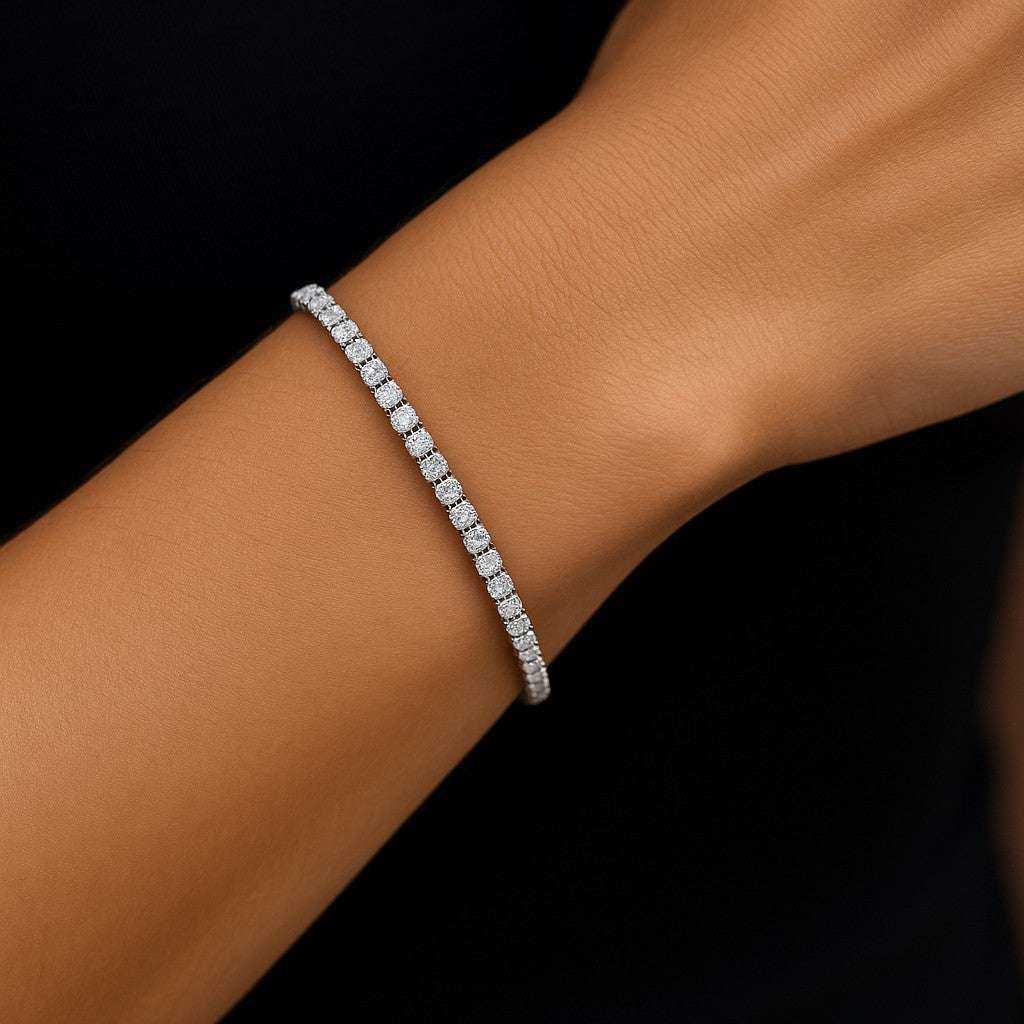 Vivid Diamonds 2.03 Ct 18K White Gold Diamond Tennis Bracelet elegantly displayed on a wrist, demonstrating its refined beauty and sophistication.