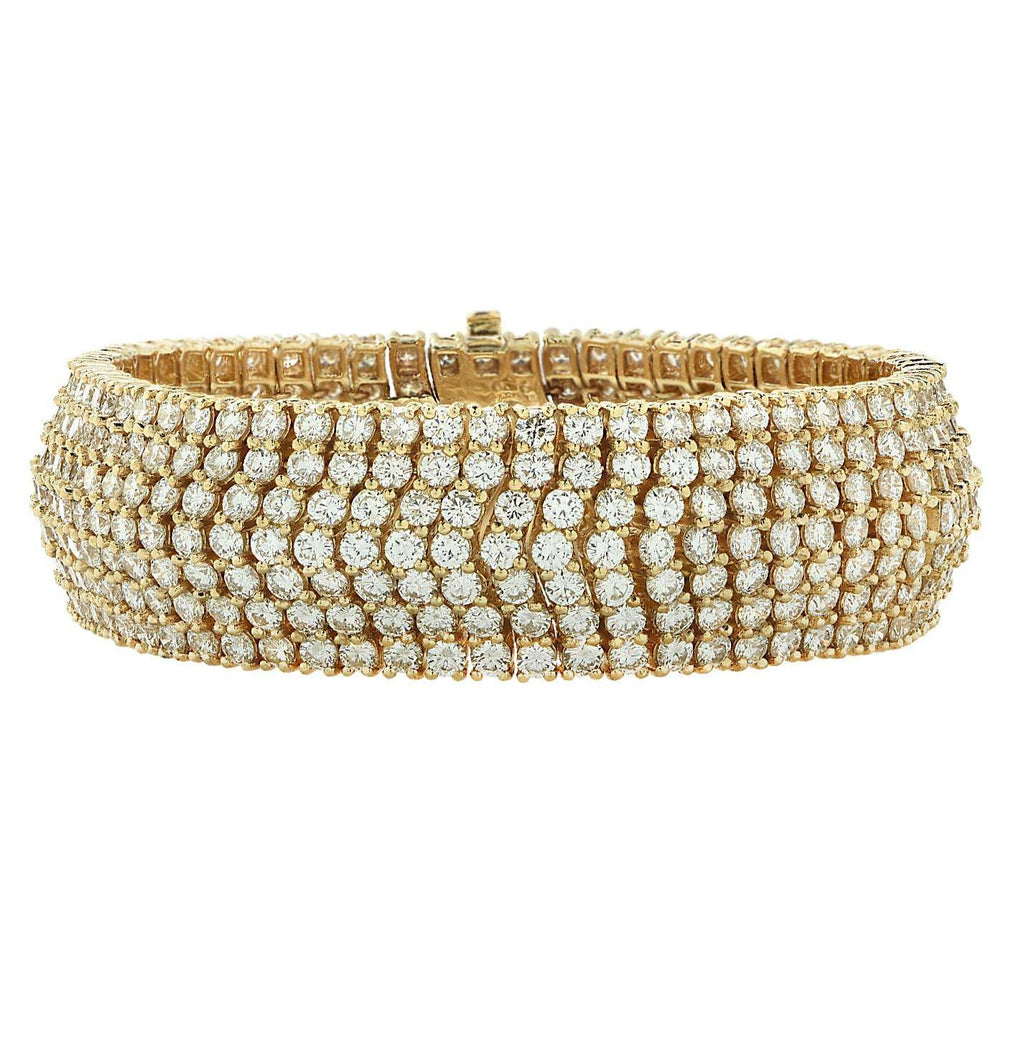 Elegant 30 Carat Diamond Domed Bracelet in 18K Yellow Gold by Vivid Diamonds, showcasing a captivating arrangement of 413 round brilliant cut diamonds with exceptional sparkle.