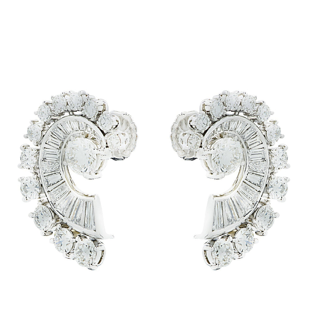 Chic Mid-Century 4 Carat Platinum Diamond Swirl Earrings by Vivid Diamonds, highlighting exquisite craftsmanship and brilliant diamond clarity for an impressive fashion statement.