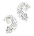 Luxury Mid-Century 4 Carat Platinum Diamond Swirl Earrings by Vivid Diamonds, featuring intricate designs with baguette and round brilliant-cut diamonds for a captivating sparkle.