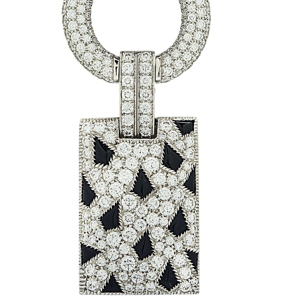 Close-up view of the Panthère De Cartier 2.8 Carat Diamond and Black Onyx Pendant in 18K White Gold by Vivid Diamonds, highlighting the intricate details and elegant craftsmanship.