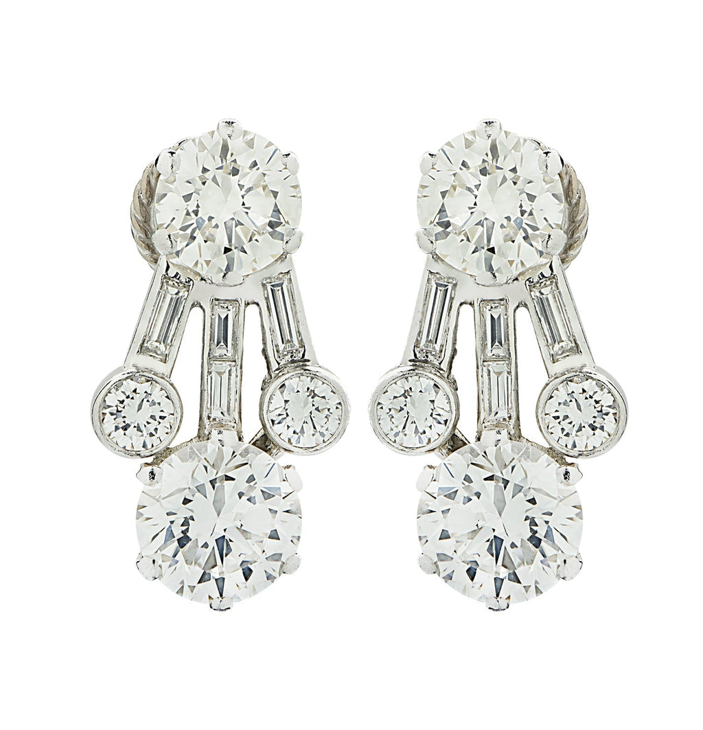 Luxurious Harry Winston 4.65 Ct Diamond Clip-On Earrings in Platinum showcasing exquisite brilliance with intricate diamond cuts, created by Vivid Diamonds.