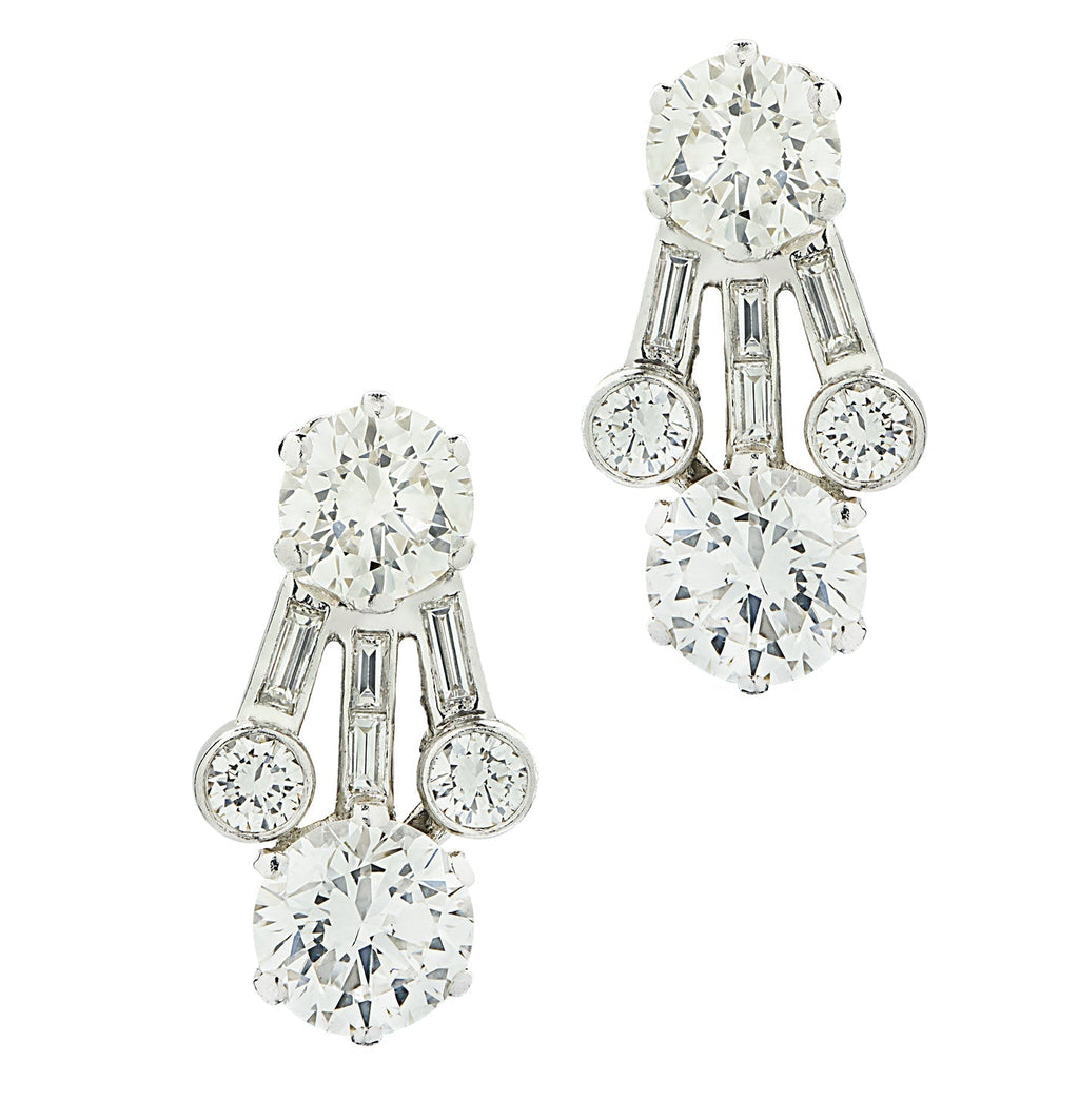 Elegant Harry Winston 4.65 Ct Diamond Clip-On Earrings in Platinum featuring brilliant and baguette cut diamonds, crafted by Vivid Diamonds.