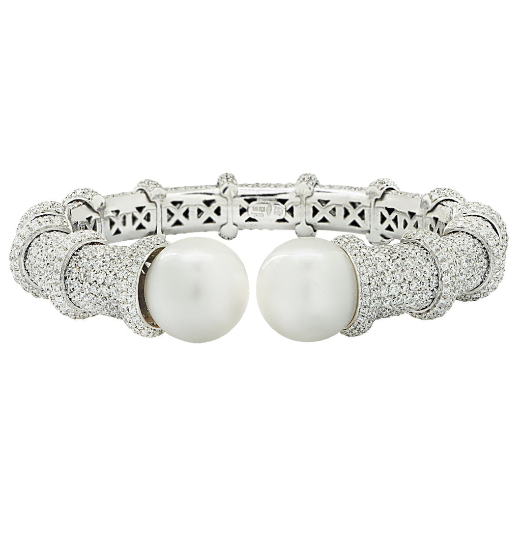 Close-up view of the 10 Carat Pave Diamond Cuff Bracelet with 14mm South Sea Pearls in 18K White Gold by Vivid Diamonds, highlighting the intricate craftsmanship and exquisite details.