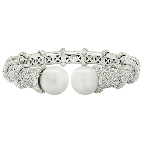Close-up view of the 10 Carat Pave Diamond Cuff Bracelet with 14mm South Sea Pearls in 18K White Gold by Vivid Diamonds, highlighting the intricate craftsmanship and exquisite details.