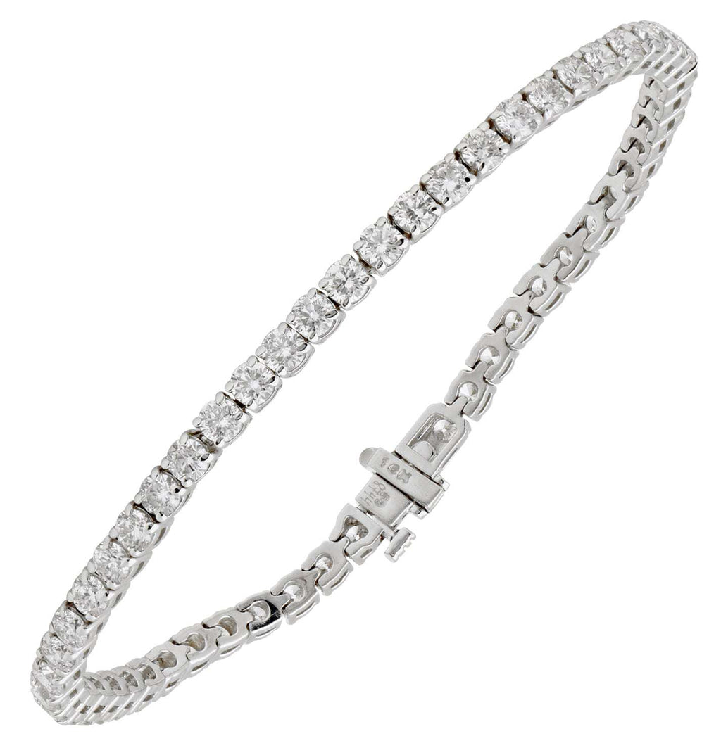 Exquisite 14K White Gold Diamond Bracelet with 51 Stones and 6.15 Carats by Vivid Diamonds, showcasing a stunning design with shimmering diamonds elegantly set in a high-quality white gold setting.
