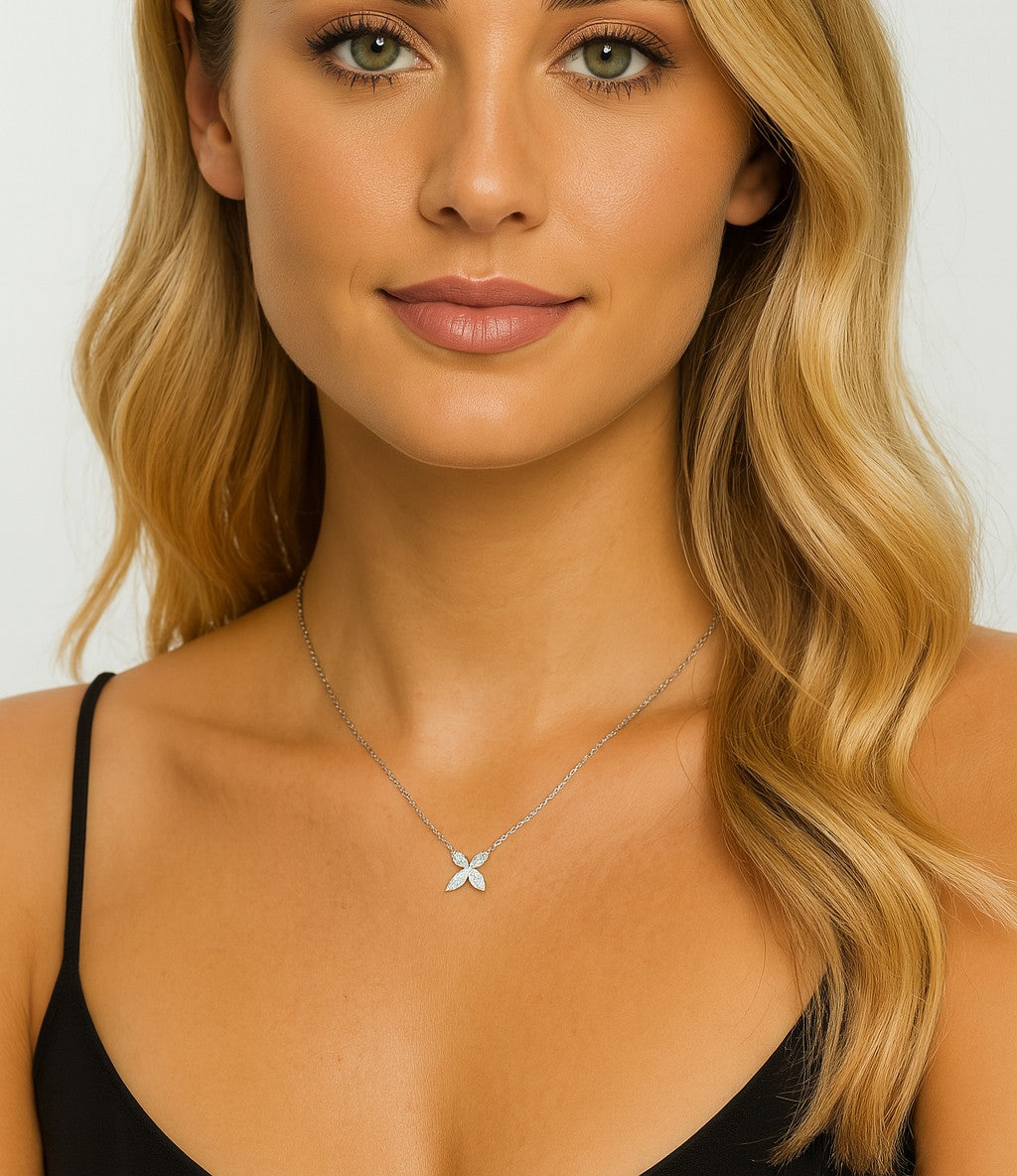 Model wearing the elegant 14k White Gold Diamond Necklace by Vivid Diamonds, showcasing its beauty against a stylish outfit.