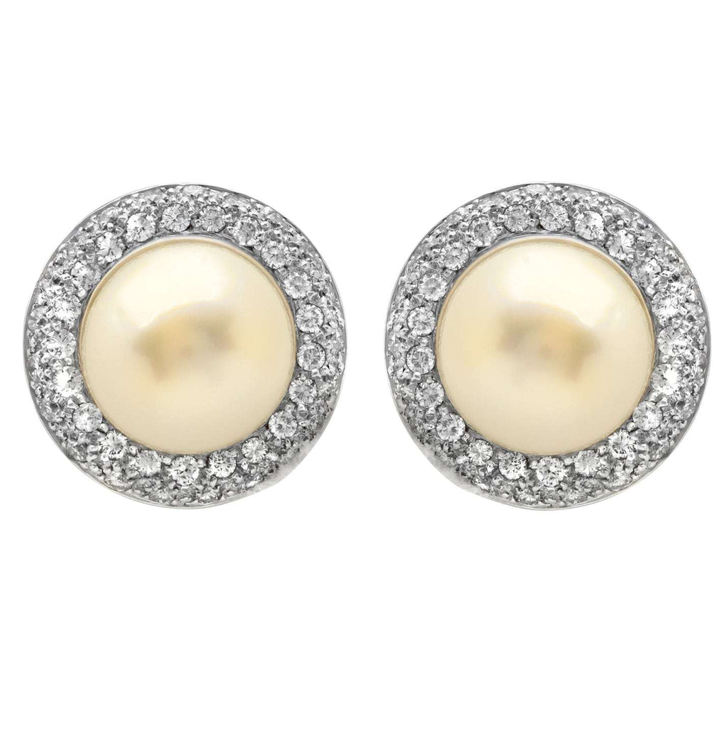 Close-up view of the Exquisite 18K White Gold Pearl & Diamond Earrings - V47314 by Vivid Diamonds, emphasizing the intricate detailing and sparkling diamonds.