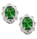 Luxury Oscar Heyman Platinum Tsavorite & Diamond Earrings featuring lush green tsavorite gemstones and sparkling diamonds, offered by Vivid Diamonds.