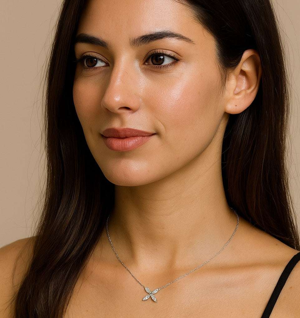 Model elegantly wearing the Exquisite Floral Diamond & White Gold Necklace from Vivid Diamonds, highlighting its sophisticated design and brilliance.