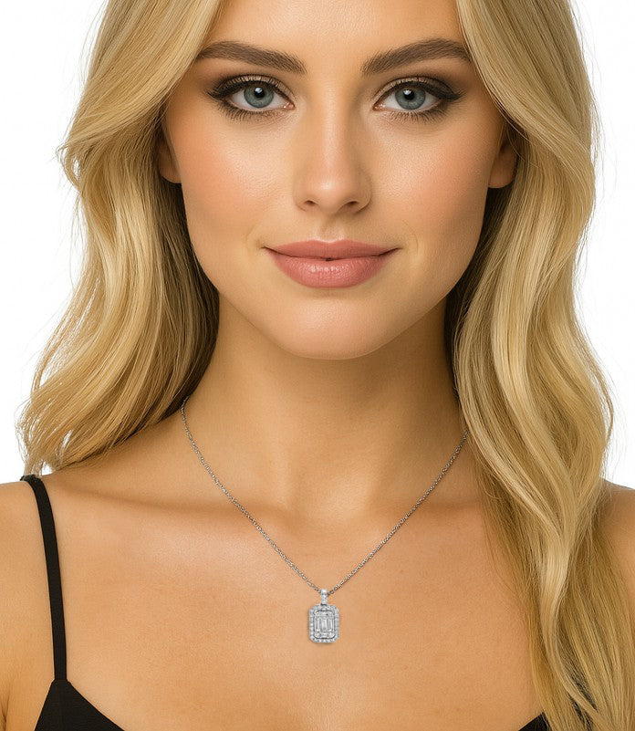 Model wearing the Elegant 0.85 Ct White Gold Diamond & Baguette Necklace by Vivid Diamonds, demonstrating its luxurious appeal and modern Art Deco design on a sophisticated neckline.