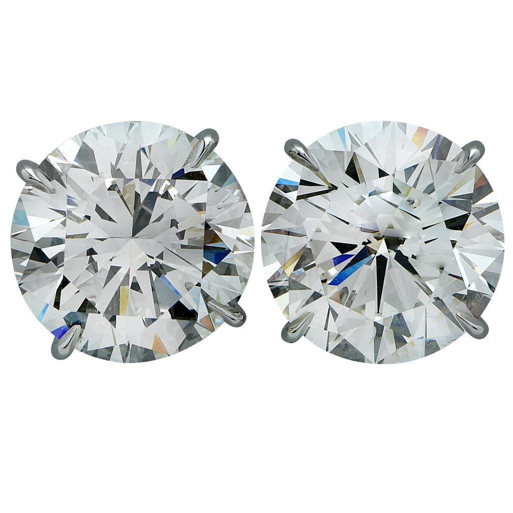 Luxury 3.41 Carat Round Brilliant Diamond & Platinum Stud Earrings by Vivid Diamonds, reflecting light with captivating brilliance.