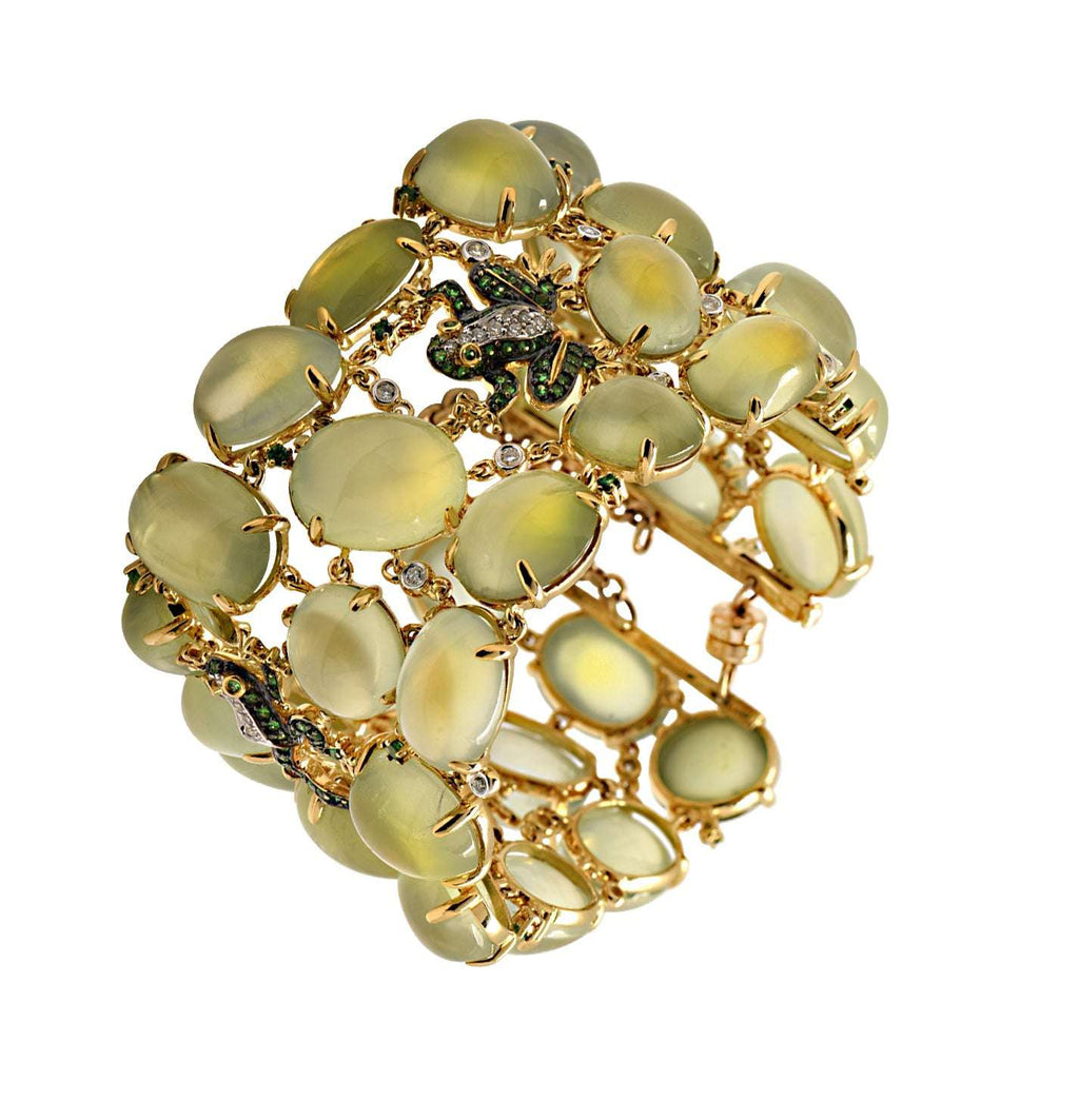 Captivating detail of the Enchanting 18K Yellow Gold Moonstone Frog Bangle with Diamonds & Tsavorites by Vivid Diamonds, highlighting the artistic craftsmanship and blending of gemstones in a stunning frog motif.