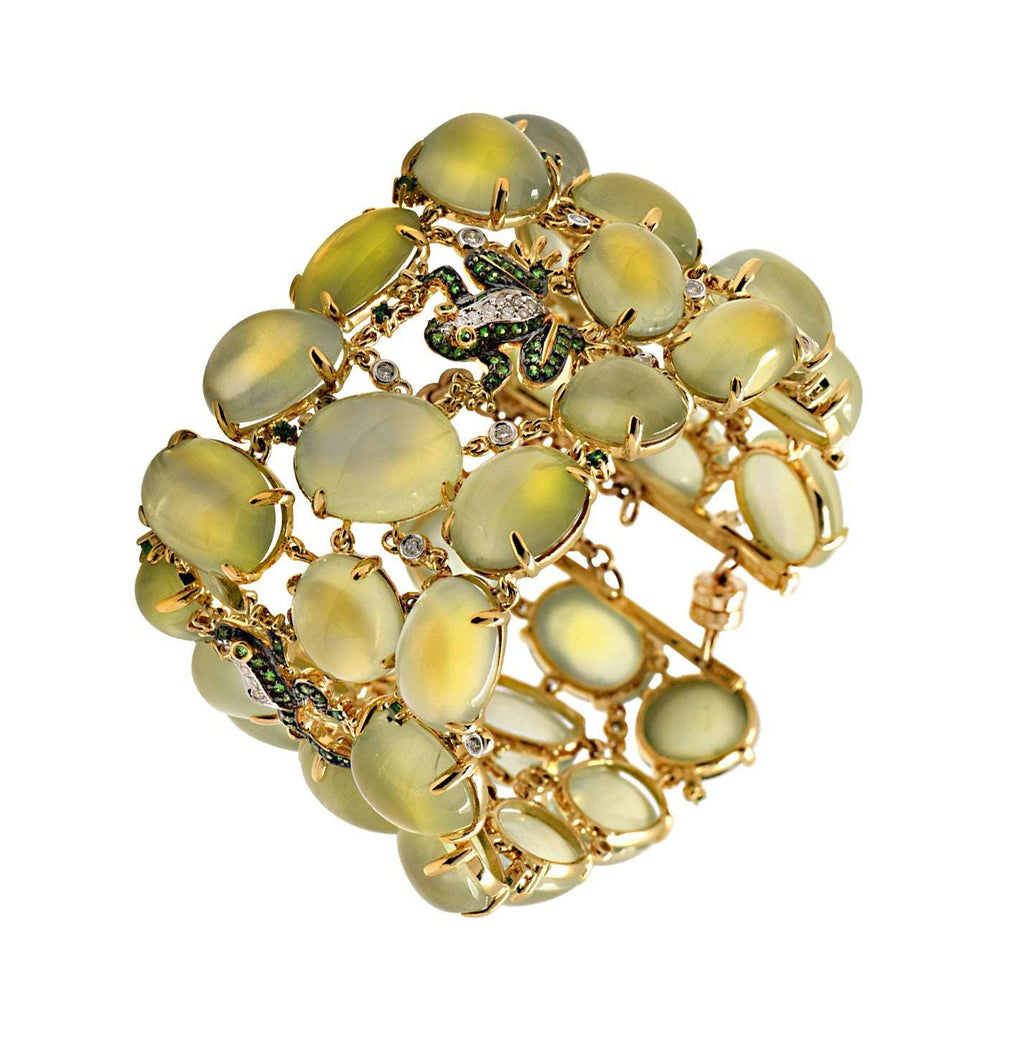 Elegant view of the Enchanting 18K Yellow Gold Moonstone Frog Bangle with Diamonds & Tsavorites by Vivid Diamonds, featuring intricate details and vibrant tsavorites that enhance its luxurious appeal.