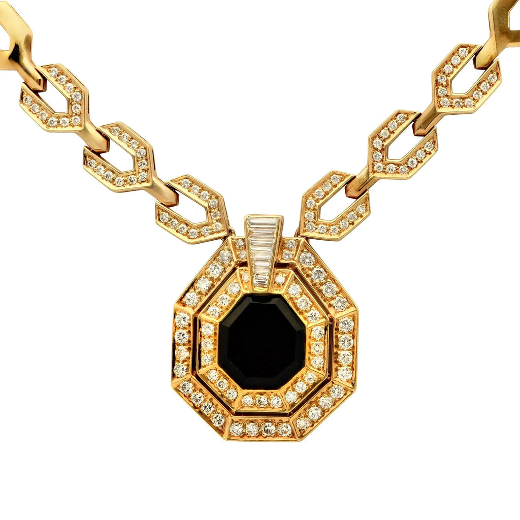 Close-up view of the stunning 18K Yellow Gold Necklace featuring a geometric design, adorned with 3.60 carats of sparkling diamonds and a luxurious onyx centerpiece, crafted by Vivid Diamonds.