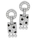 Luxurious Cartier Panthère 54 Earrings crafted in 18K White Gold, featuring exquisite pavé set diamonds and striking black onyx inlays, available from Vivid Diamonds.