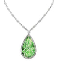 Exquisite Carved Green Jade & Diamond Necklace in 18K White Gold by Vivid Diamonds, featuring a stunning carved jadeite teardrop pendant surrounded by a halo of brilliant-cut diamonds on a delicate chain.