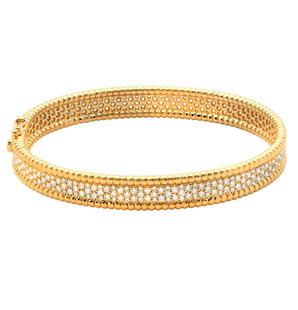 Luxury 18k Yellow Gold Bracelet with 293 Diamonds - 3.22 Carats displayed elegantly, highlighting its radiant diamonds and exquisite craftsmanship by Vivid Diamonds.