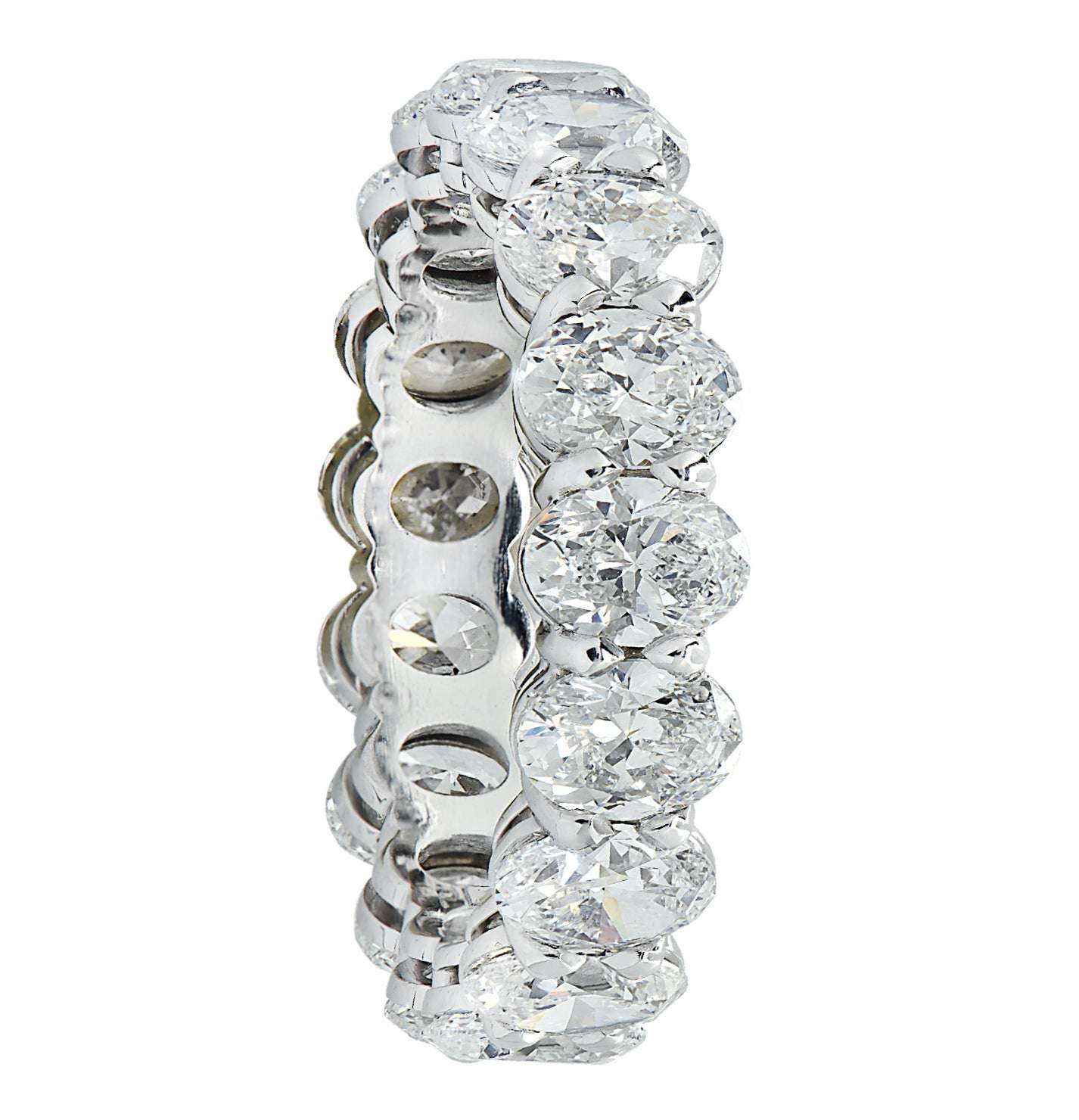 Vivid Diamonds 4.39 Ct Platinum Diamond Eternity Band viewed from the side, featuring 18 radiant oval cut diamonds in a stunning arrangement.