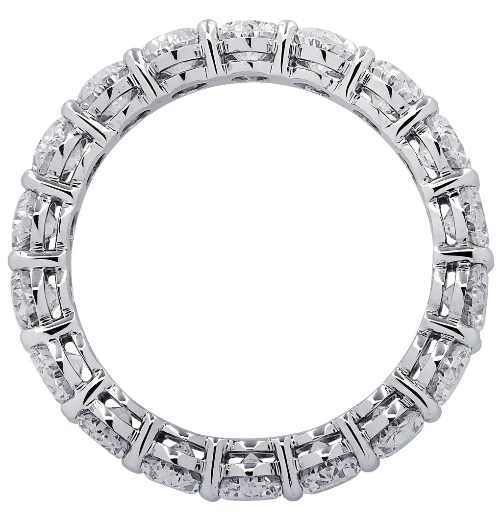 Elegant view of Vivid Diamonds 4.31 Carat Platinum Eternity Band with 18 oval cut diamonds, designed for timeless beauty, size 5.75.