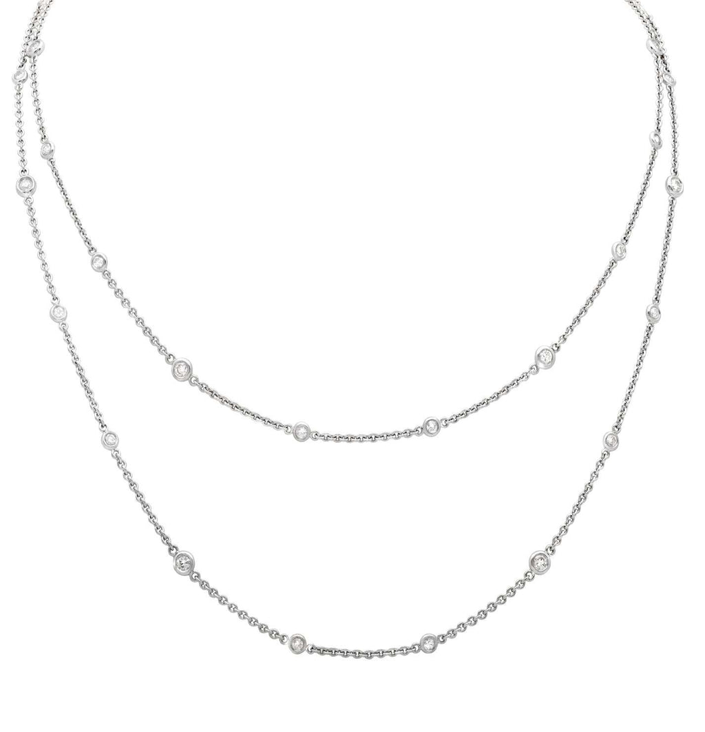 Close-up view of the Elegant 18K White Gold Diamond Necklace with 2.2ct Round Brilliant Diamonds by Vivid Diamonds, emphasizing the craftsmanship and sparkle of the round brilliant diamonds set in luxurious white gold.