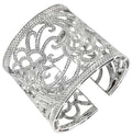 Exquisite Italian 18K White Gold Wide Open Work Cuff Bangle featuring 6 Carat Round Brilliant Cut Diamonds by Vivid Diamonds. This luxurious jewelry piece showcases intricate open-work design, highlighting the brilliant sparkle of diamonds with contempora