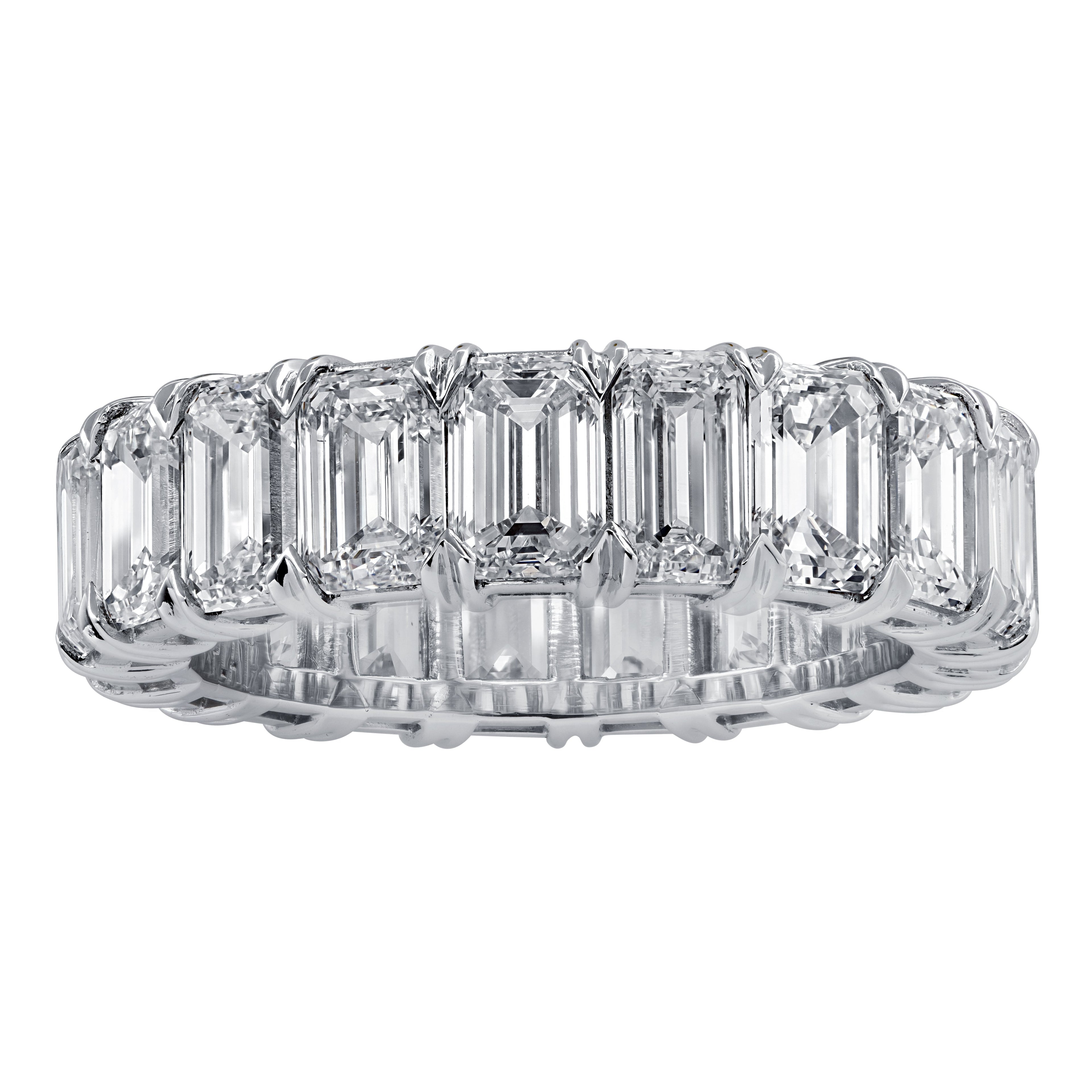 Elegant view of Vivid Diamonds 5.12 Ct Emerald Cut Diamond Eternity Band in Platinum with 22 VVS Clarity Diamonds, highlighting its timeless appeal and exquisite brilliance.