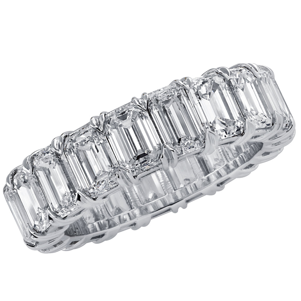 Vivid Diamonds 5.12 Ct Emerald Cut Diamond Eternity Band in Platinum featuring 22 VVS Clarity Diamonds, showcasing stunning craftsmanship and luxurious design.