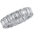 Vivid Diamonds 5.12 Ct Emerald Cut Diamond Eternity Band in Platinum featuring 22 VVS Clarity Diamonds, showcasing stunning craftsmanship and luxurious design.